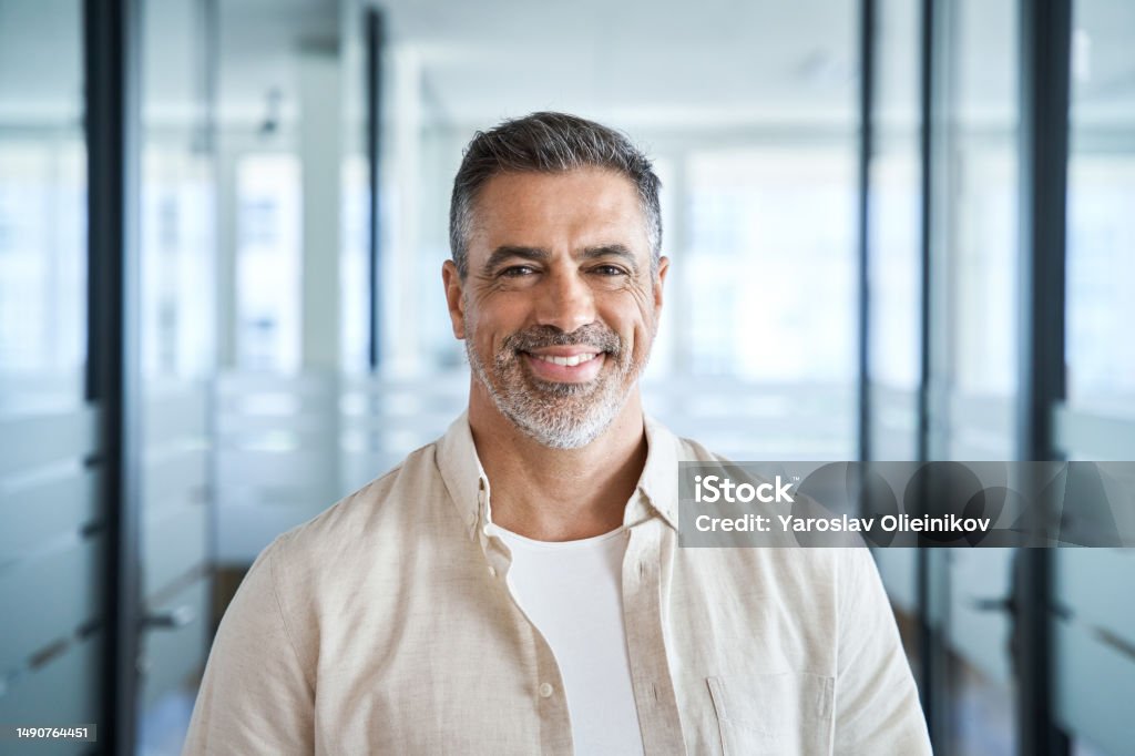 Headshot of First Lastname<br />
$100,000